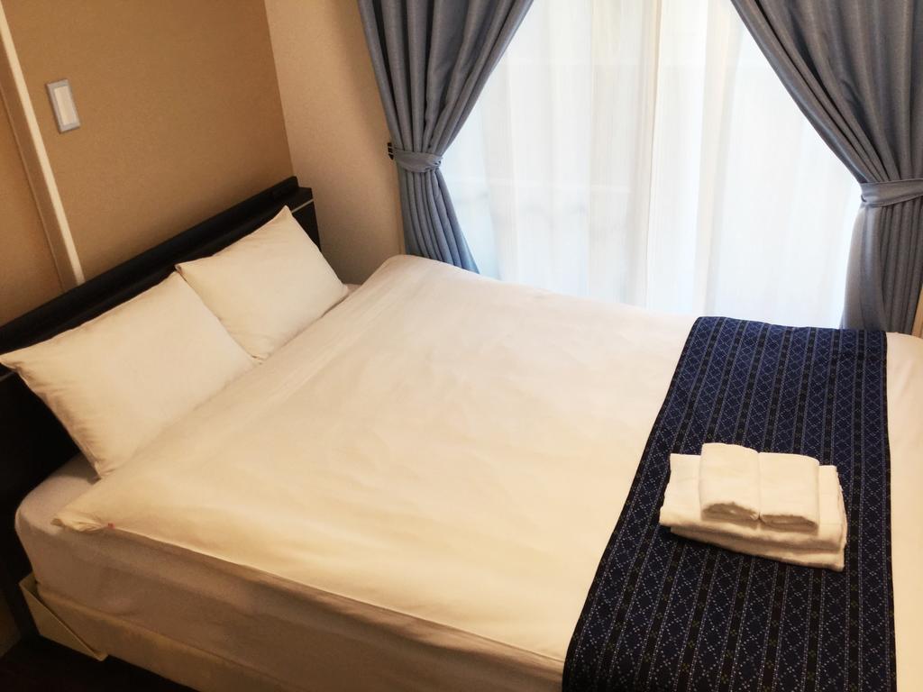 Mr. Kinjo In Makishi Aparthotel Naha Kültér fotó